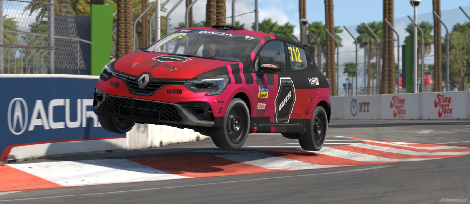 Project GRS Renault Clio airborne in the new red livery